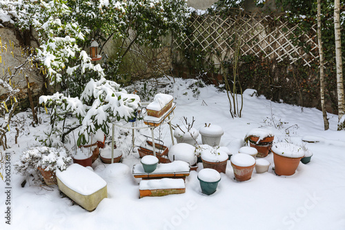Photos Neige sur pots de fleurs du jardin
