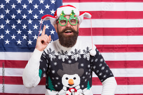 Where liberty dwells. Happy new year. Happy guy celebrate xmas and new year. Bearded hipster man happy smiling american flag background. Happy holidays. Merry Christmas. Holiday season in USA © be free