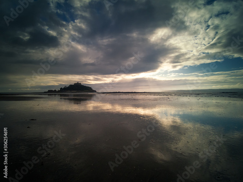 st michaels mount beach and reflection on a stormy day 
