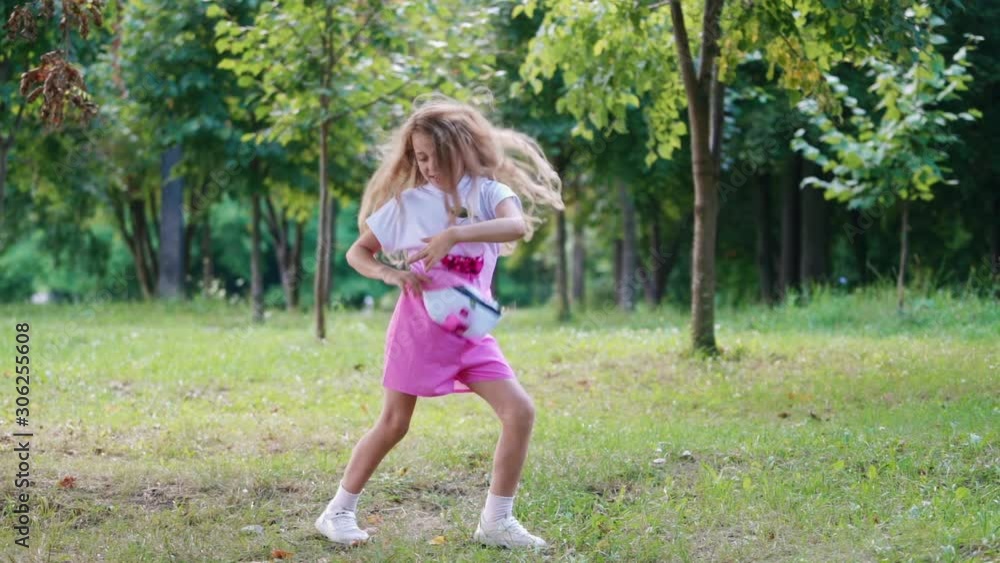 Girl enjoying life. Happy fashion girl having fun on nature Girl enjoying life. Happy fashion girl having fun on nature