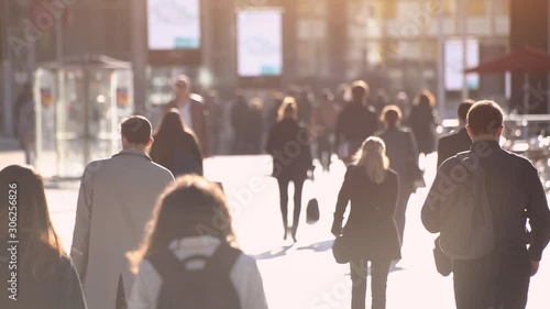 unrecognizable people walking on the street, crowd in big city