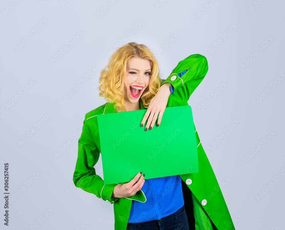Winking woman holds advertising board. Market, shop, sale, discount. Advertising and sale. Advertising banner. Seasons sale. Discount. Copy space for text. Stylish woman holds sign board. Sign board. Winking woman holds advertising board. Market, shop, sale, discount. Advertising and sale. Advertising banner. Seasons sale. Discount. Copy space for text. Stylish woman holds sign board. Sign board.