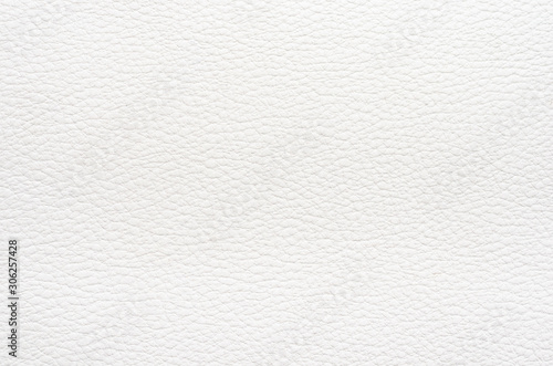Close-up of natural white leather background . Top view, copy space .