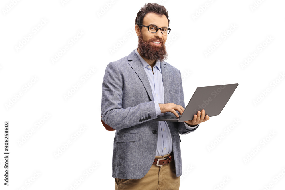 Bearded man holding a laptop computer and smiling at the camera Bearded man holding a laptop computer and smiling at the camera