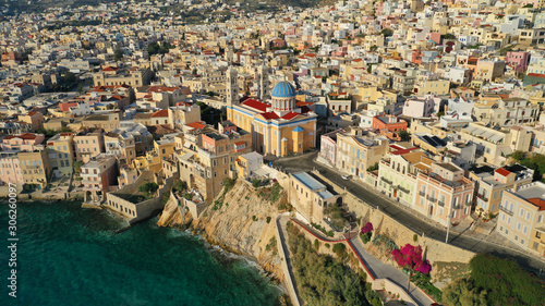 Aerial drone photo of picturesque district built by the sea of Vaporia in main town of Syros or Siros island Ermoupolis and famous church of Agios Nikolaos, Cyclades, Greece © aerial-drone