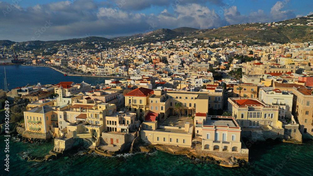 Aerial drone photo of pictruesque district built by the sea of Vaporia in main town of Syros or Siros island Ermoupolis near famous church of Agios Nikolaos, Cyclades, Greece