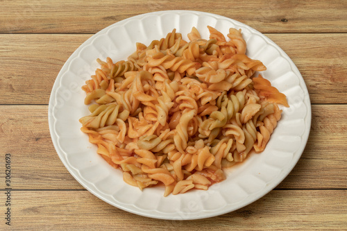 Penne pasta on a plate with sauce