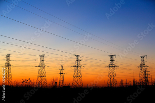 High voltage tower, silhouetted in the evening
