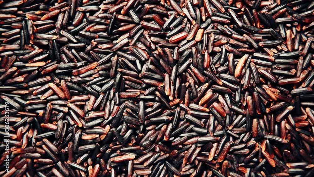 Black rice as natural food background. Top view. Healthy diet gluten free Black rice as natural food background. Top view. Healthy diet gluten free