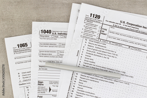 Obraz na płótnie Tax form business financial concept: macro view of individual return tax form and ballpoint pen w salonie