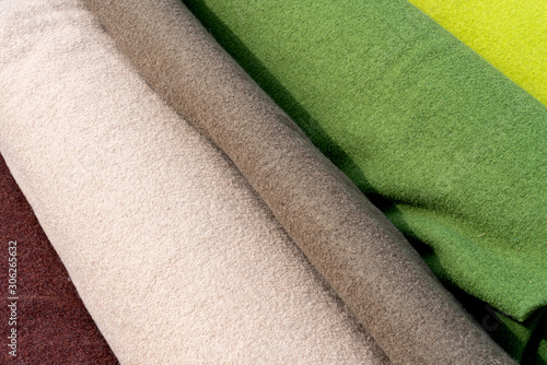 Soft woolen fabrics for medieval clothing in various colours. Broadcloth is a dense, plain woven cloth of wool. photo