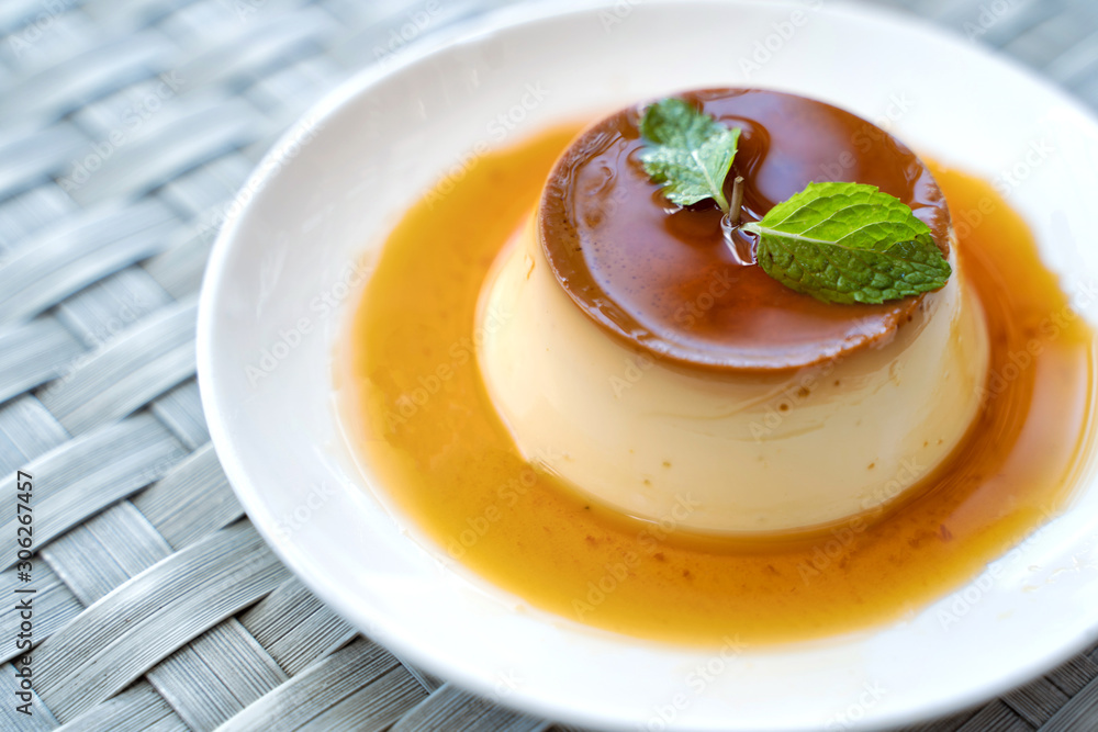 Pudding Caramel Custard with top view of a creme caramel, caramel custard or custard pudding. Pudding Caramel Custard with top view of a creme caramel, caramel custard or custard pudding.