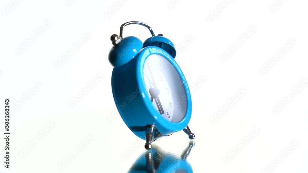 The clock rotates on a white background. At 06:00 hours The clock rotates on a white background. At 06:00 hours