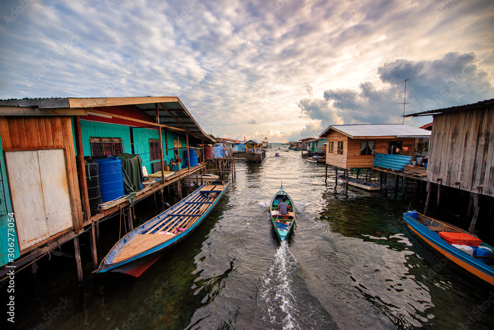 Sunrise by the water village in Semporna, Sabah. Sunrise by the water village in Semporna, Sabah.