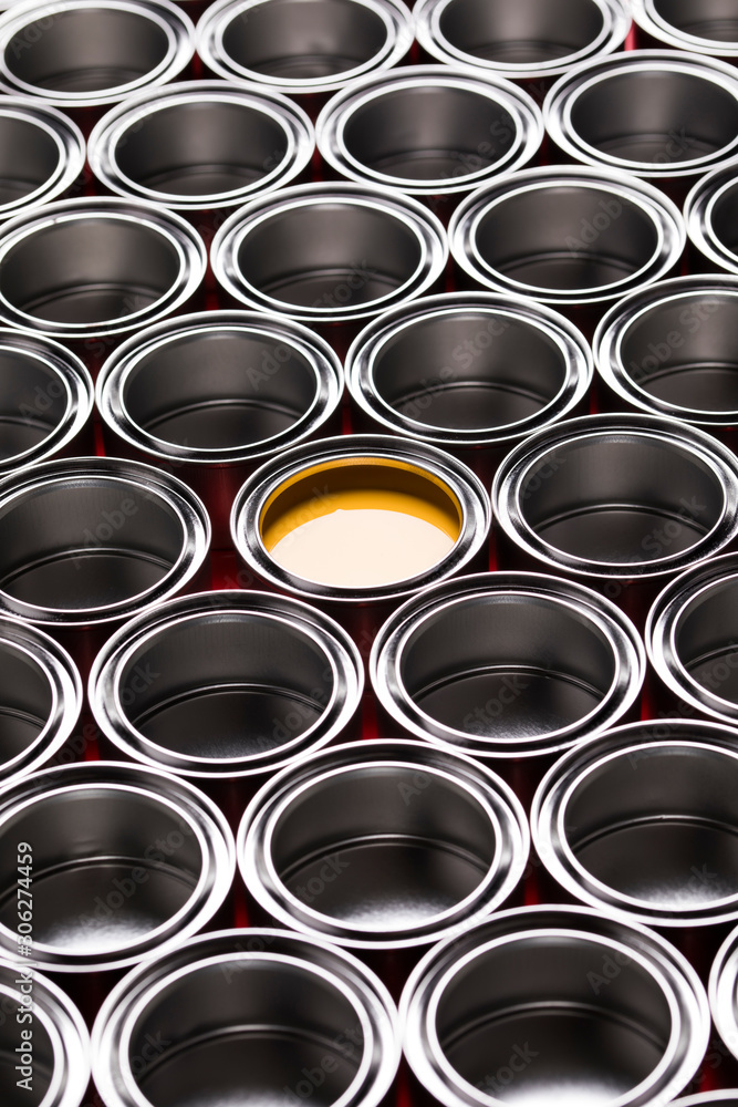 Group of tin metal cans with color paint Group of tin metal cans with color paint