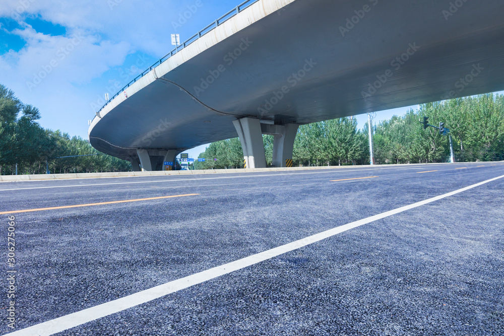 Blue sky overpass under the asphalt road, car advertising road material Blue sky overpass under the asphalt road, car advertising road material
