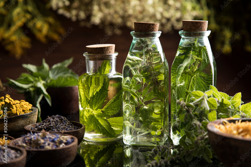 Oil and Natural medicine, wooden table background Oil and Natural medicine, wooden table background
