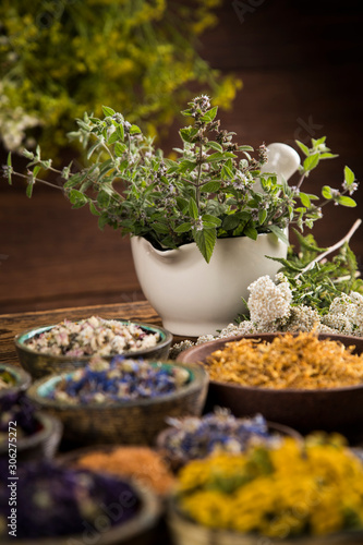Natural remedy,Herbal medicine and wooden table background