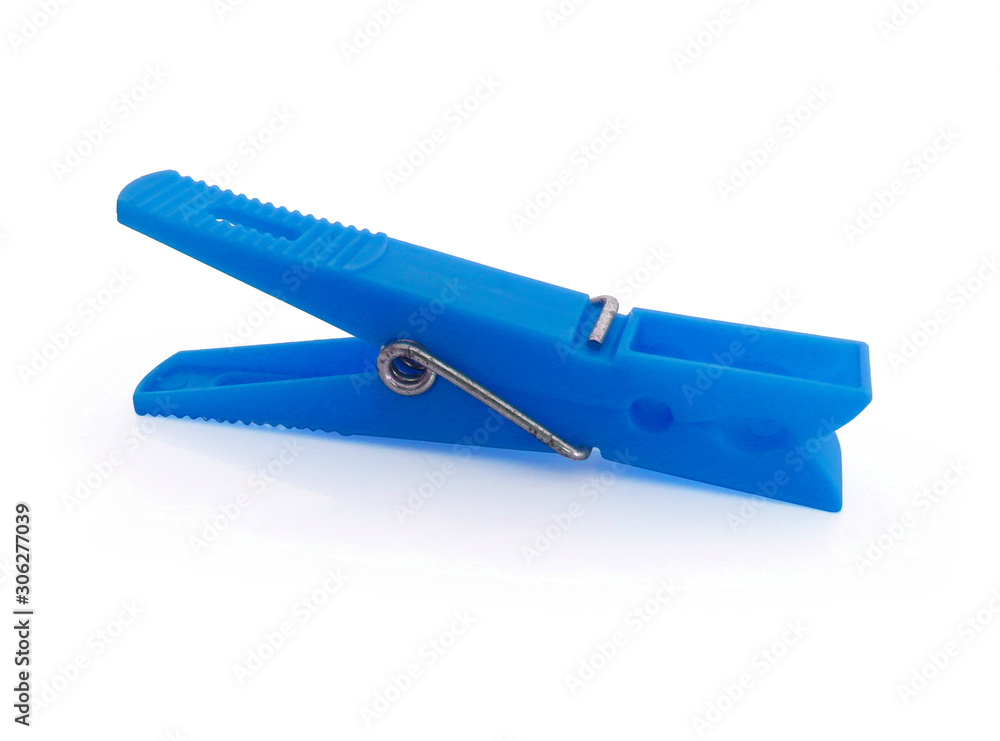 Isolated green plastic clothespin on white background. Isolated green plastic clothespin on white background.