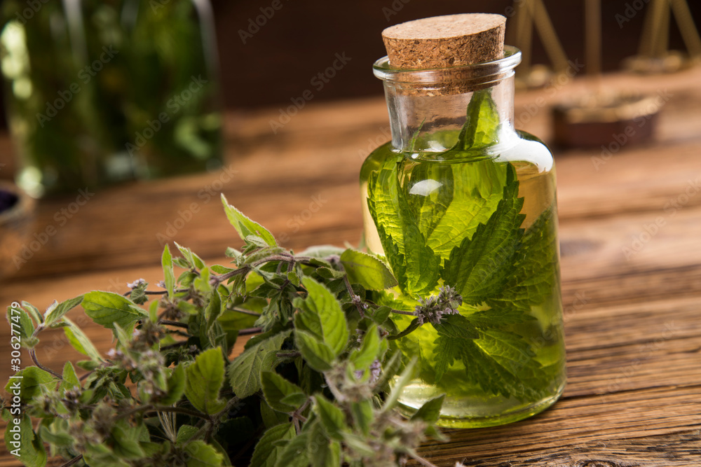 Oil and Natural medicine, wooden table background Oil and Natural medicine, wooden table background