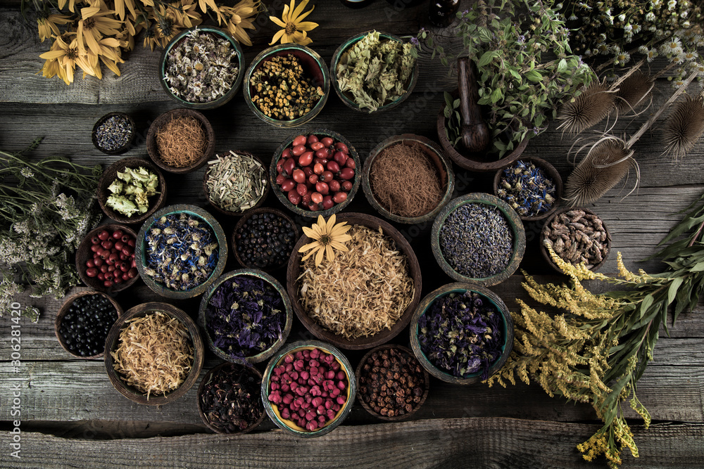 Natural remedy,Herbal medicine and wooden table background Natural remedy,Herbal medicine and wooden table background