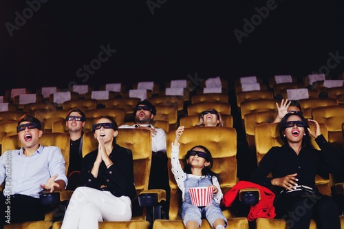 group of young people in cinema