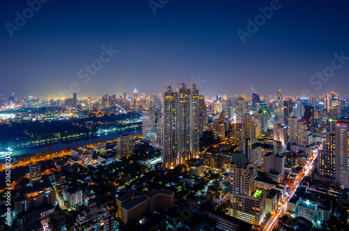Cityscape night view of Bangkok modern City business building and high skyscraper at Bangkok,Thailand.