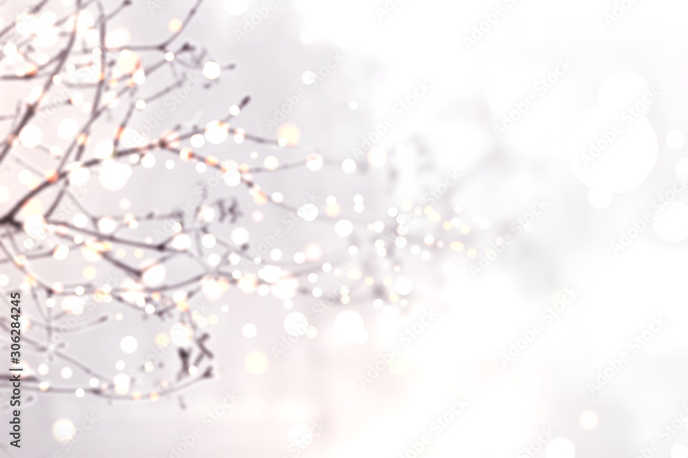 Glitter sparkles on branches of tree blur pattern. White winter subtle background. Glitter sparkles on branches of tree blur pattern. White winter subtle background.