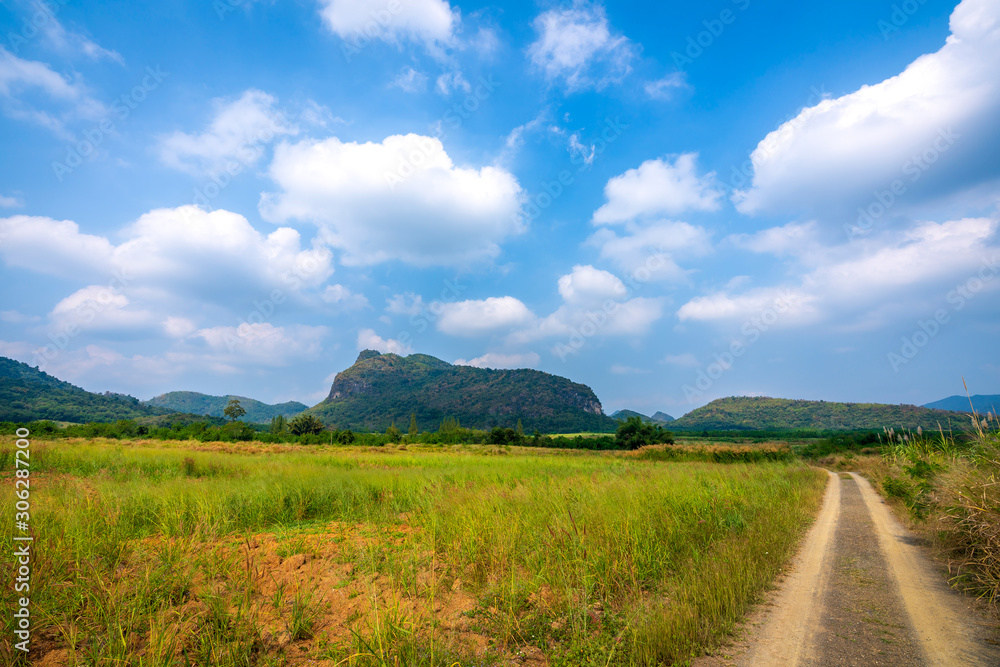 beautiful blue sky green forest mountains lake view at Kaeng Krachan National Park, Thailand.  an idea for backpacker hiking on long weekend or a couple, family holiday activity camping relaxing