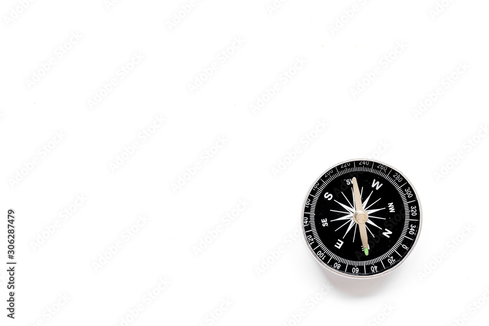Compass - small and stylish - on white background top view copy space Compass - small and stylish - on white background top view copy space