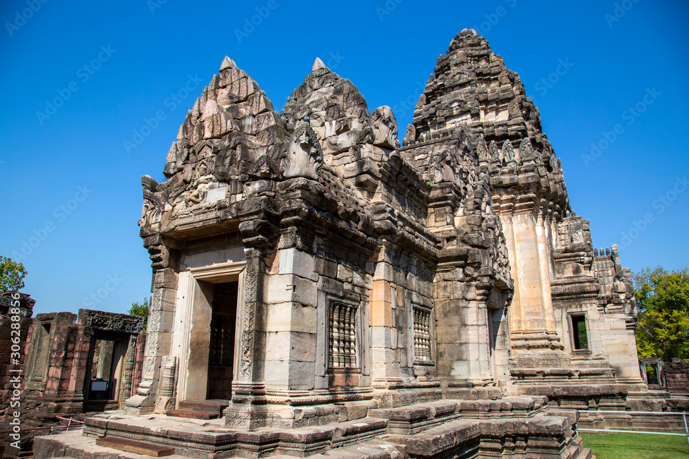Naklejka premium The Phimai castle historical park is the largest ancient Khmer architecture temples. Prasat Hin Phimai ancient sandstone castle in Thailand.