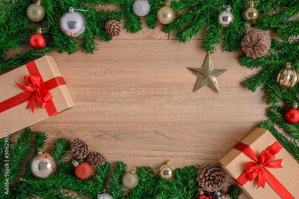 Christmas fir tree with decoration on wooden board Christmas fir tree with decoration on wooden board