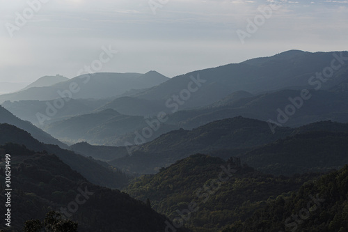 Foggy morning landscape on a green mountain scenic view in Pyrenees