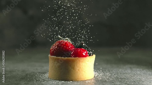 Powdered Sugar Falling on Fruit Tart in Slow Motion