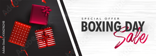 Sale header or banner design with top view of gift boxes on black and white texture background for Boxing Day.