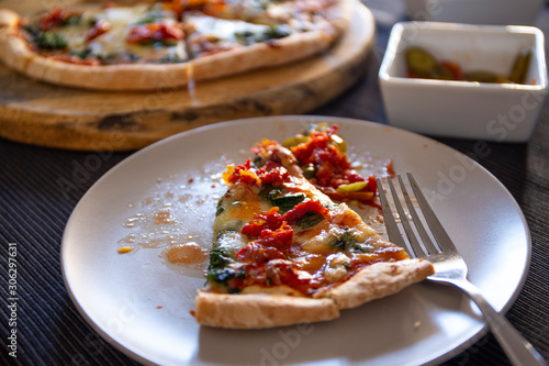 Homemade spinach pizza with mozzarella