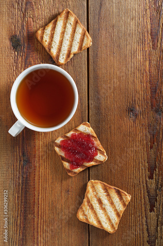 Toasted bread with jam and tea