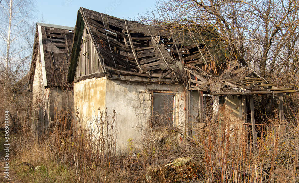 Old broken roof on a country house Old broken roof on a country house