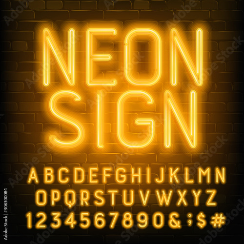 Neon Sign alphabet font. Yellow neon letters and numbers. Brick wall background. Stock vector typescript for your typography design.