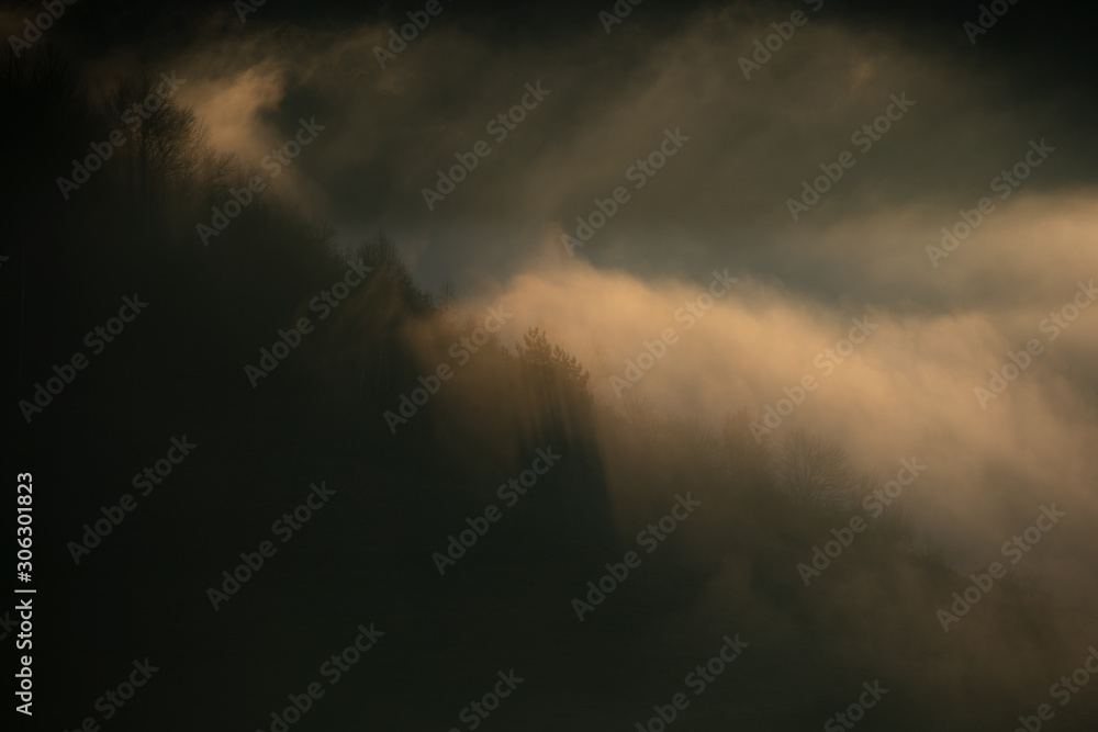 Alpine sea in the mountains. Dumesti a village from Romania cover in fog. Alpine sea in the mountains. Dumesti a village from Romania cover in fog.