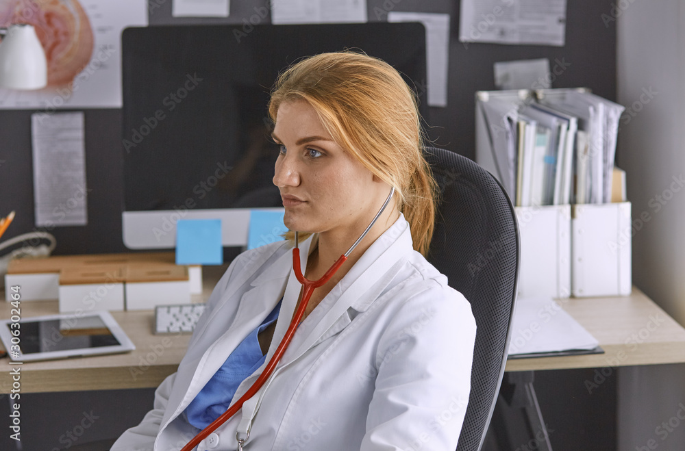 young woman doctor takes patient in office young woman doctor takes patient in office
