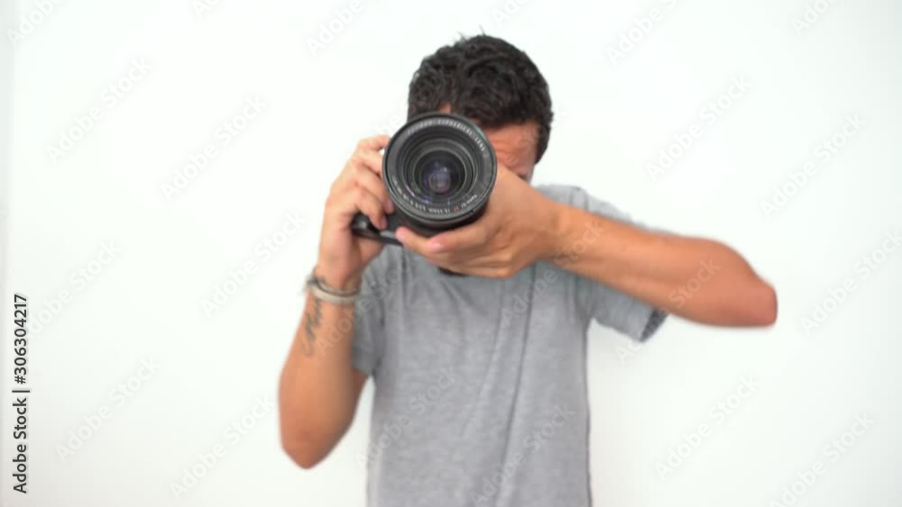 photographer taking pictures with a professional camera photographer taking pictures with a professional camera