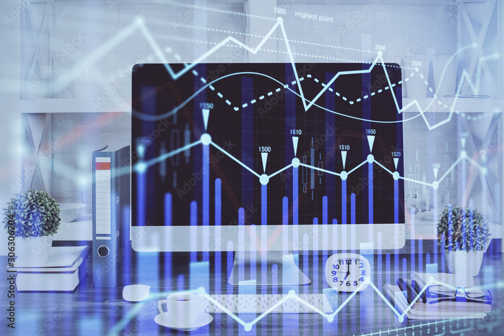 Forex graph hologram on table with computer background. Double exposure. Concept of financial markets. Forex graph hologram on table with computer background. Double exposure. Concept of financial markets.