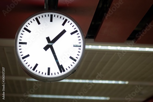 Black and white clock in trains station