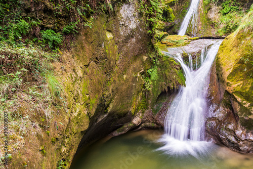 Caglieron caves and waterfalls. Magic of emerald. Vittorio Veneto  Italy