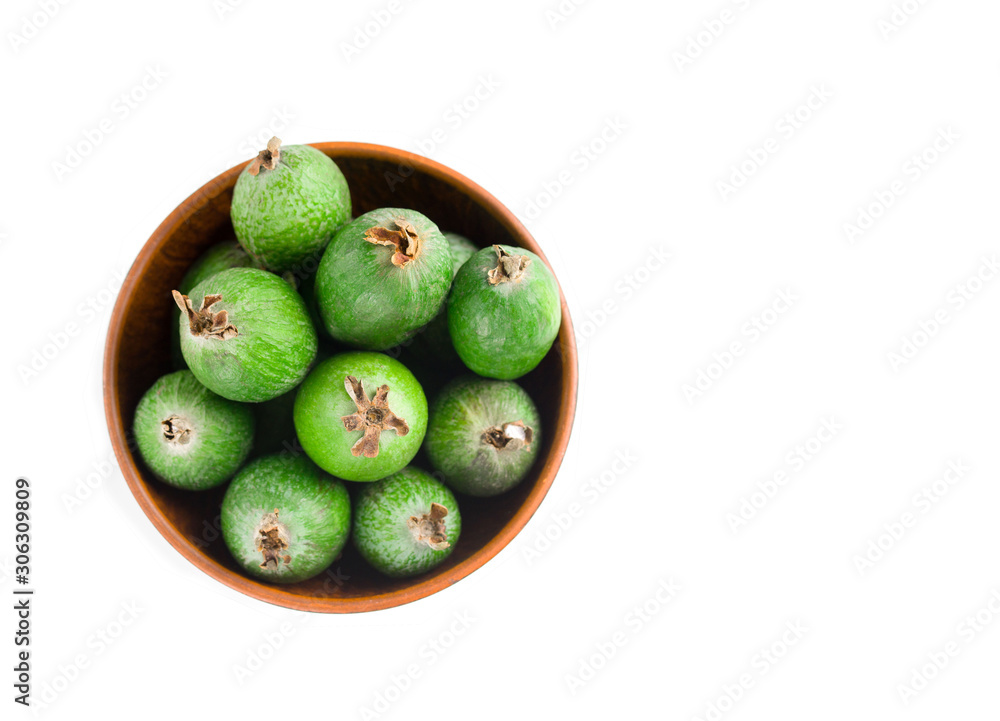 Juicy and ripe feijoa isolated on a white background. Healthy autumn fruit. Juicy and ripe feijoa isolated on a white background. Healthy autumn fruit.