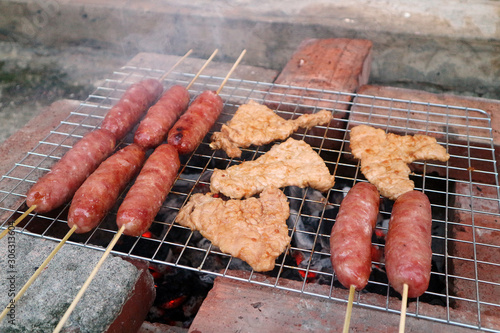 Closeup grilled meat, taiwanese cuisine on white background