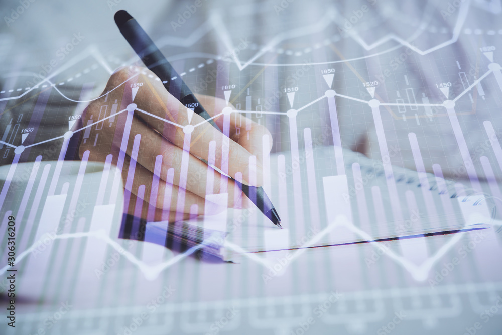 Forex chart displayed on woman's hand taking notes background. Concept of research. Double exposure Forex chart displayed on woman's hand taking notes background. Concept of research. Double exposure