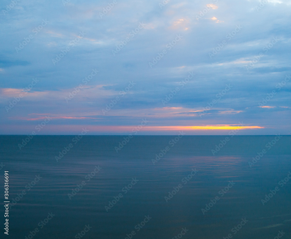 Calm sea in a cloudy morning Calm sea in a cloudy morning