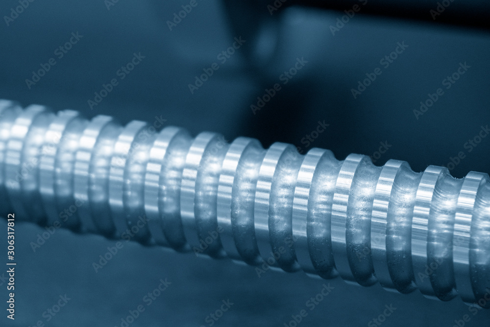 Close up scene of CNC machine lead ball screw spare parts .  The CNC milling machine spare parts manufacturing process.